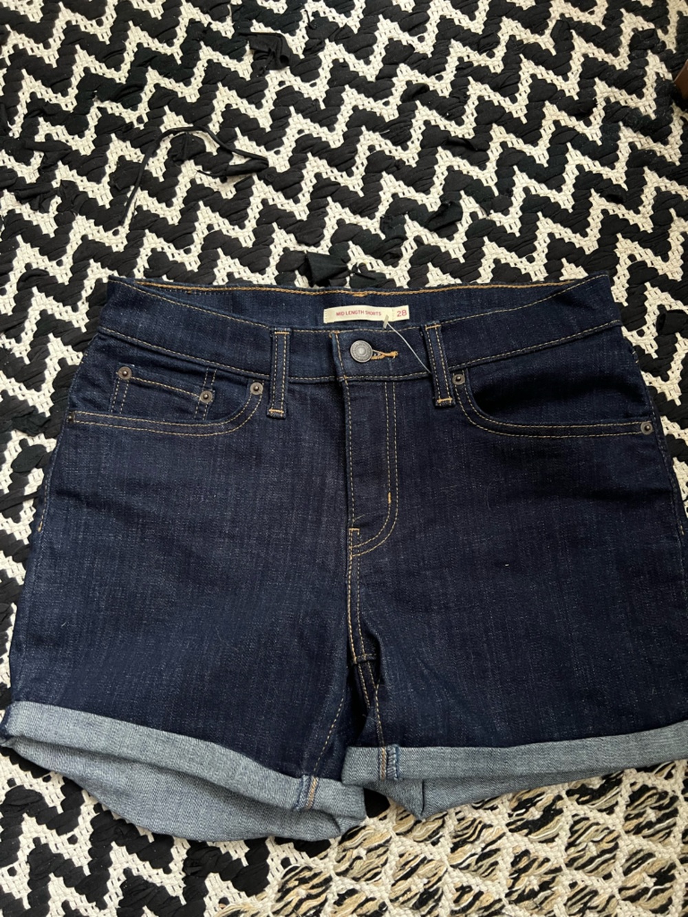 Levi’s Dark Indigo Mid-Length Jean Shorts